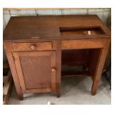Old desk converted to sewing machine table