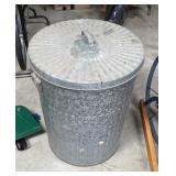 Galvanized trash can with burlap sacks, etc.