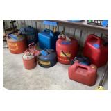 Gas cans under table