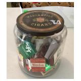 Matchbooks in cigar jar