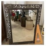 Wall mirror with iron frame