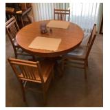 45" round oak pedestal table with 4 chairs
