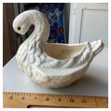 White ceramic swan planter