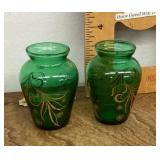 Pair of small green glass gold decorated vases