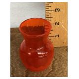 Miniature red glass vase
