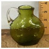 Green glass pitcher