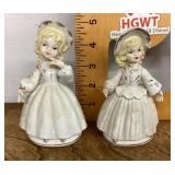 Pair of porcelain girl figures