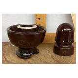 2 brown ceramic insulators