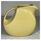 Yellow Homer Laughlin Fiesta disc pitcher