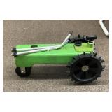 Green tractor sprinkler