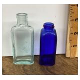 2 mini glass medicine bottles
