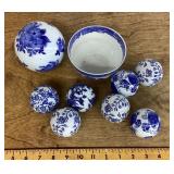 Blue and white ceramic balls and bowl