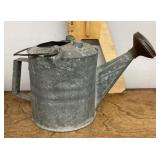 Vintage galvanized watering can