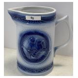 9" blue and white pottery pitcher