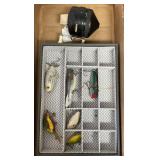 Flat with fishing reel and lures
