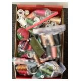 Flat w/spools of thread and pin cushion