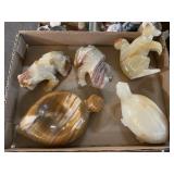 5 carved stone animals
