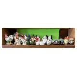 Shelf of vintage salt and pepper shakers