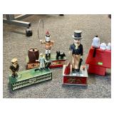 2 cast iron mechanical banks, 2 plastic banks