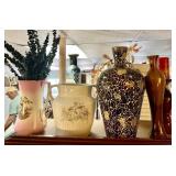 4 tall vases and pillar candle holder