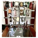 Metal jewelry display with watches