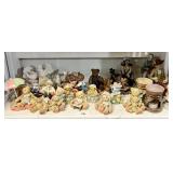 Shelf of Cherished Teddies figurines