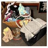 Basket with dog accessories and small carrier
