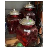 3 ruby red glass canisters