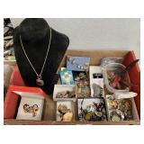 Flat of costume jewelry