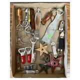 Flat of bottle openers and architectural stars