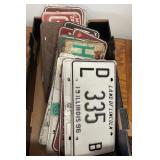 Flat of vintage license plates