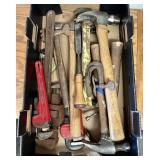 Flat of hammers and pipe wrenches