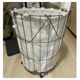 Wire laundry basket on casters