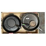Flat of cast iron skillets