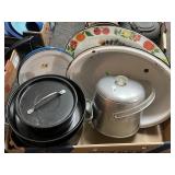 Flat with enamelware, ice bucket, camp cook
