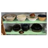 Shelf of stoneware and pottery mixing bowls
