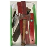 Double-bit axe, wooden levels, hanging scales,