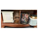 Bottom shelf contents with pipe stand, etc.