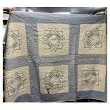 48x82 blue and white cross stitch quilt