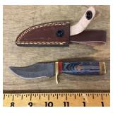 Fixed blade pocket knife with sheath