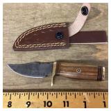 Fixed blade pocket knife with sheath