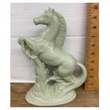 Green ceramic rearing stallion figure