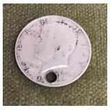 1964 Kennedy half dollar -- drilled