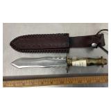 Fixed blade knife with tooled leather sheath