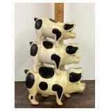 Cast-iron piggyback pigs doorstop