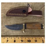 Fixed blade pocket knife with sheath