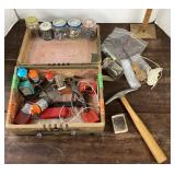 Small old suitcase with hardware and tools