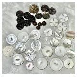 Antique metal and mother-of-pearl buttons