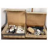 2 boxes of electrical and plumbing parts