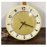 Vintage yellow Lux electric kitchen clock